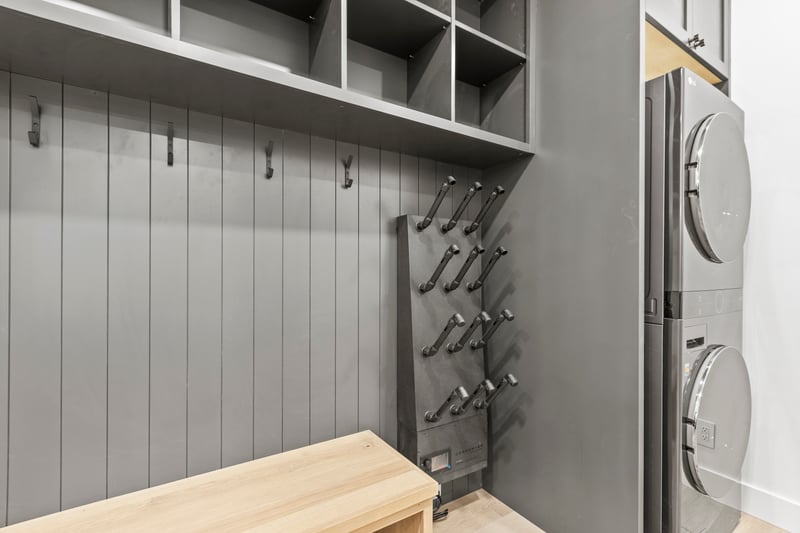 Custom built-ins offer plenty of space to store boots, gear, and outerwear.