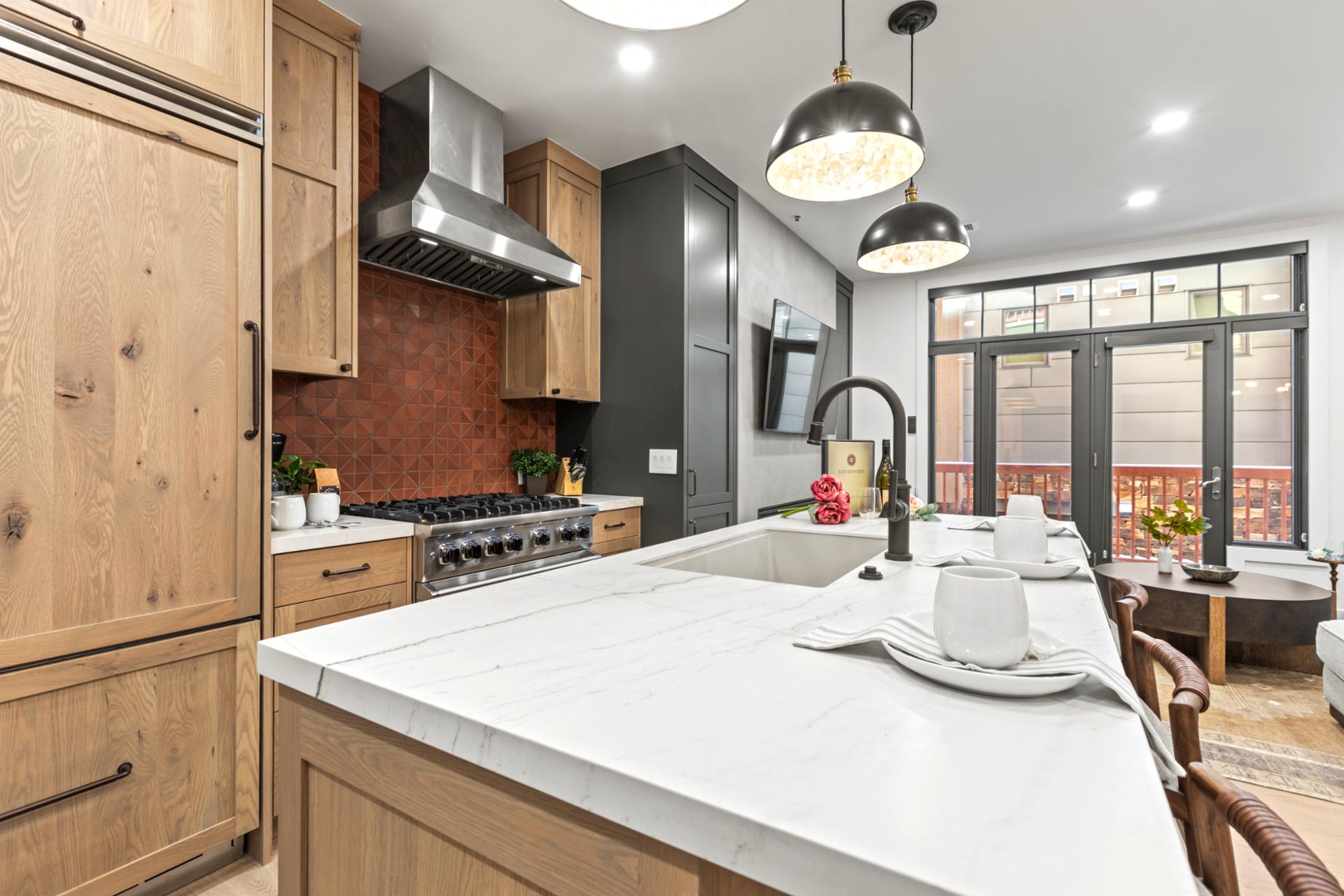 Custom cabinetry and sleek appliances blend form and function for easy at-home meals.