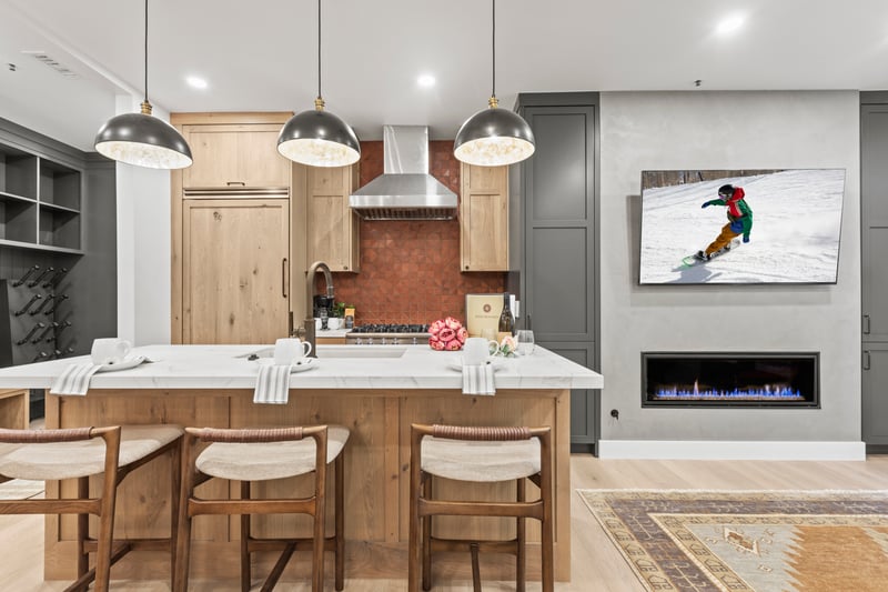 Bar seating for four and pendant lighting make this an easy place for morning coffee or casual bites.