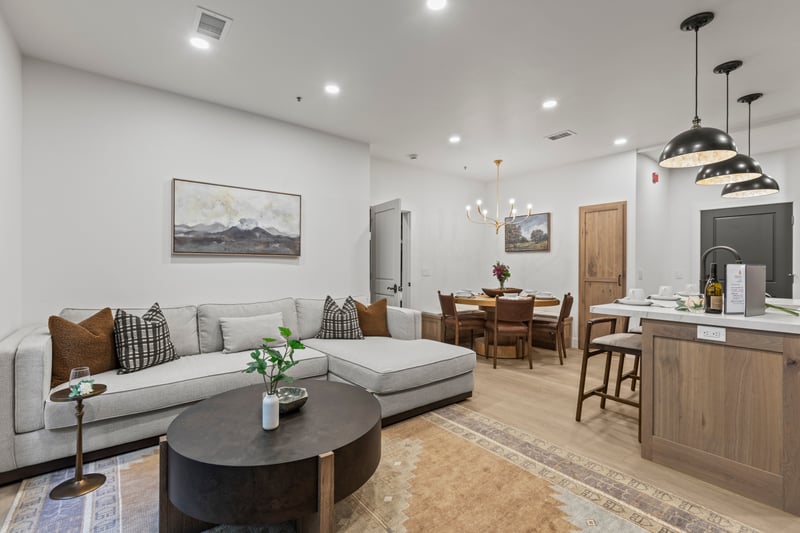 Clean lines and soft textiles give this open living area a modern, welcoming feel.