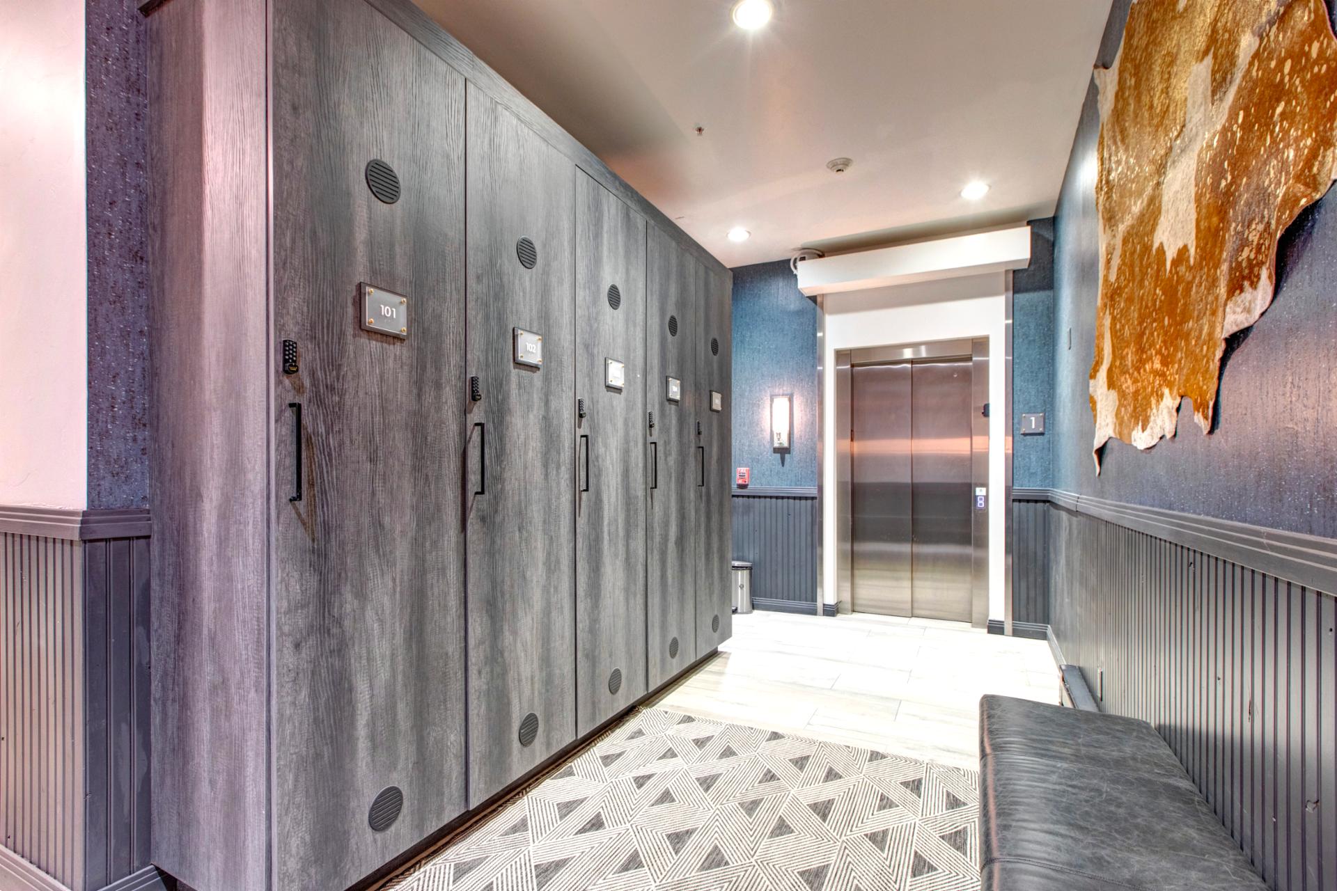 Community locker room with ski storage and private changing area.