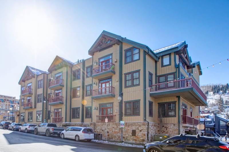 Exterior of the building with Lift Lodge’s classic alpine style and Main Street location.