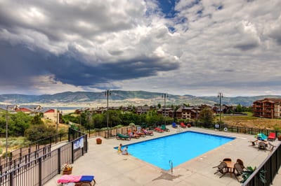 Cool off at the community pool with panoramic mountain views and ample lounge space.