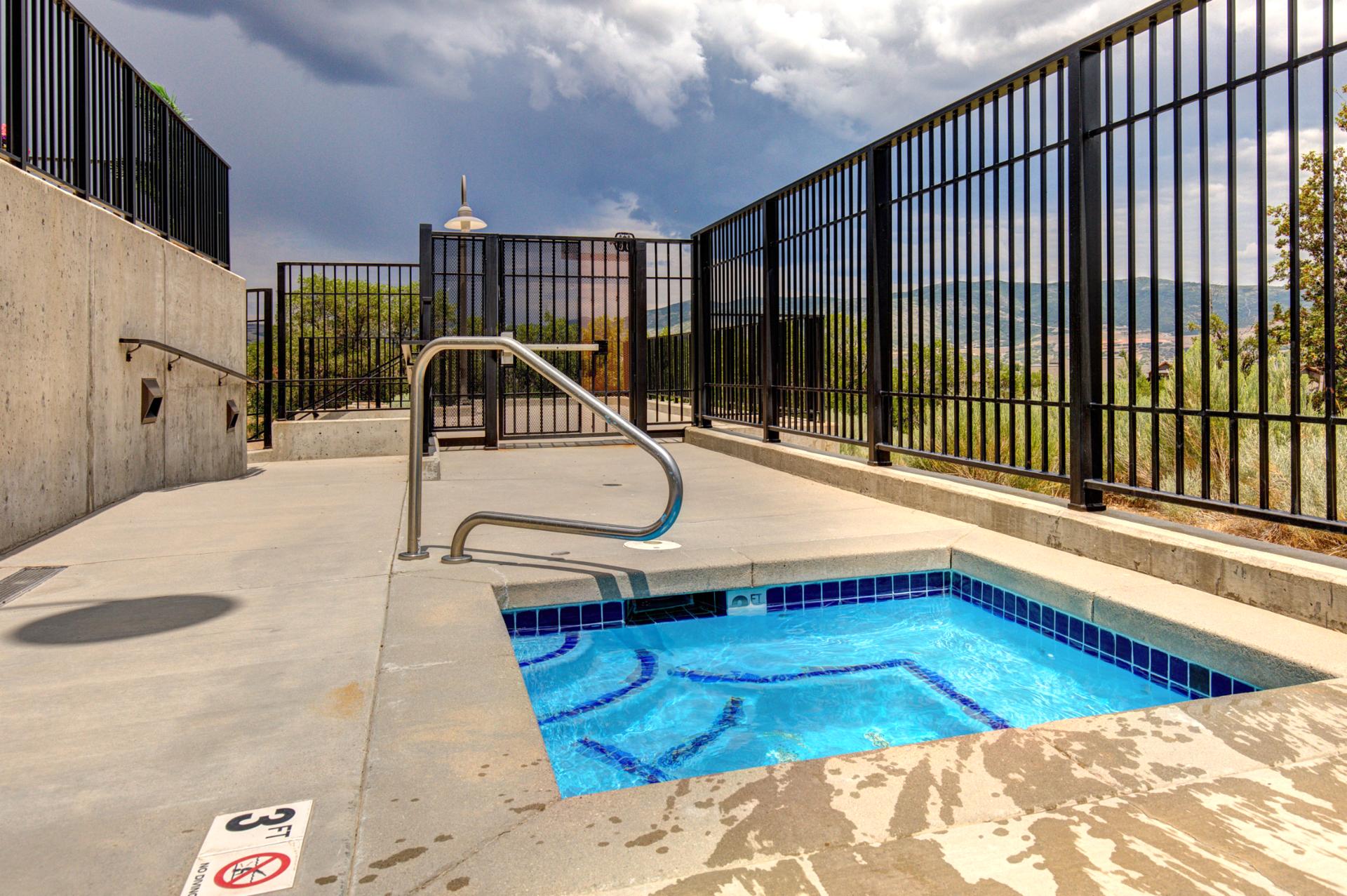 Soak your muscles in the outdoor hot tub while taking in peaceful views of the valley below.