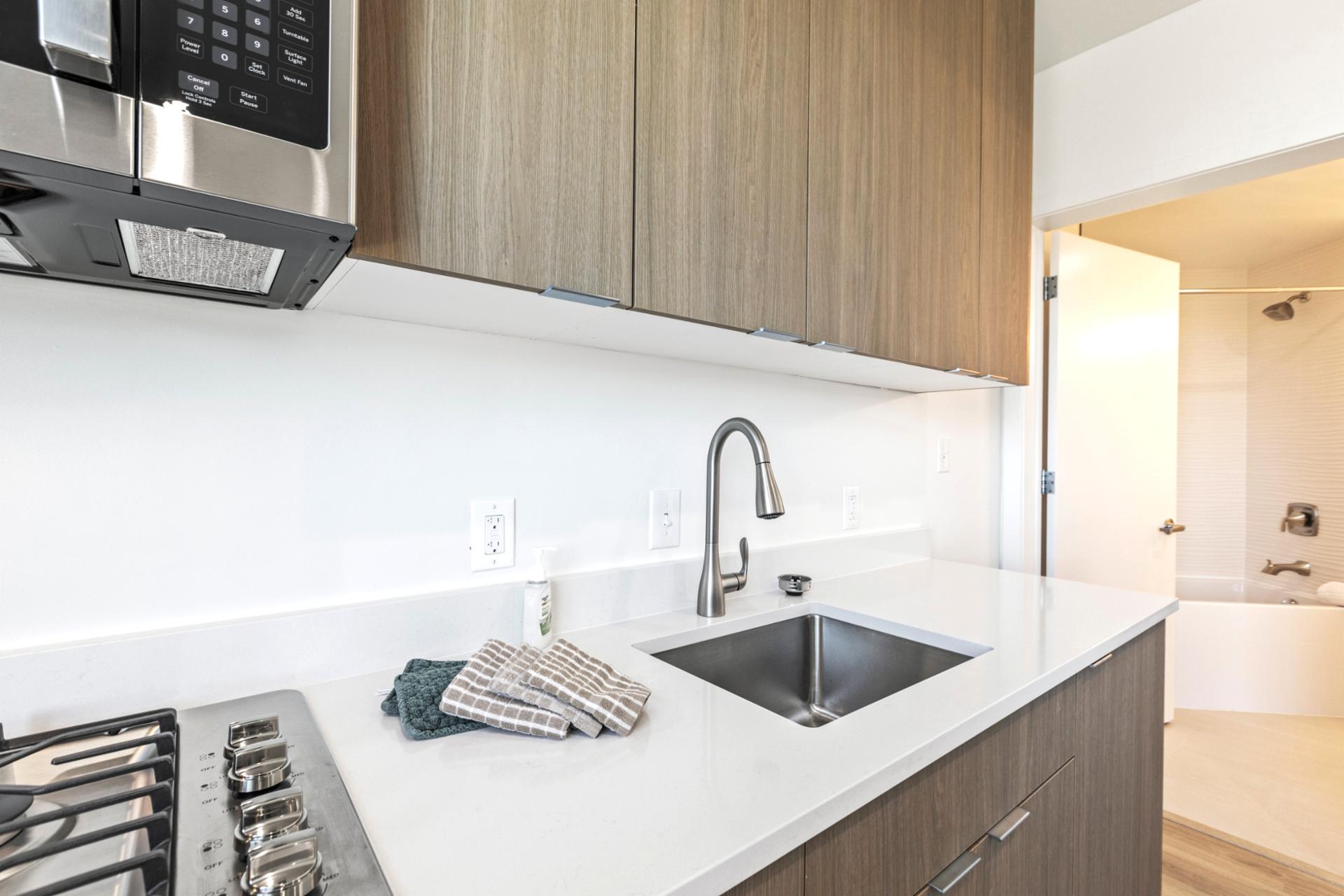 From coffee to cocktails, this sleek guest kitchenette adds extra convenience to your stay.