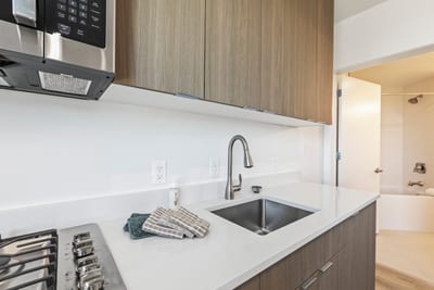 From coffee to cocktails, this sleek guest kitchenette adds extra convenience to your stay.