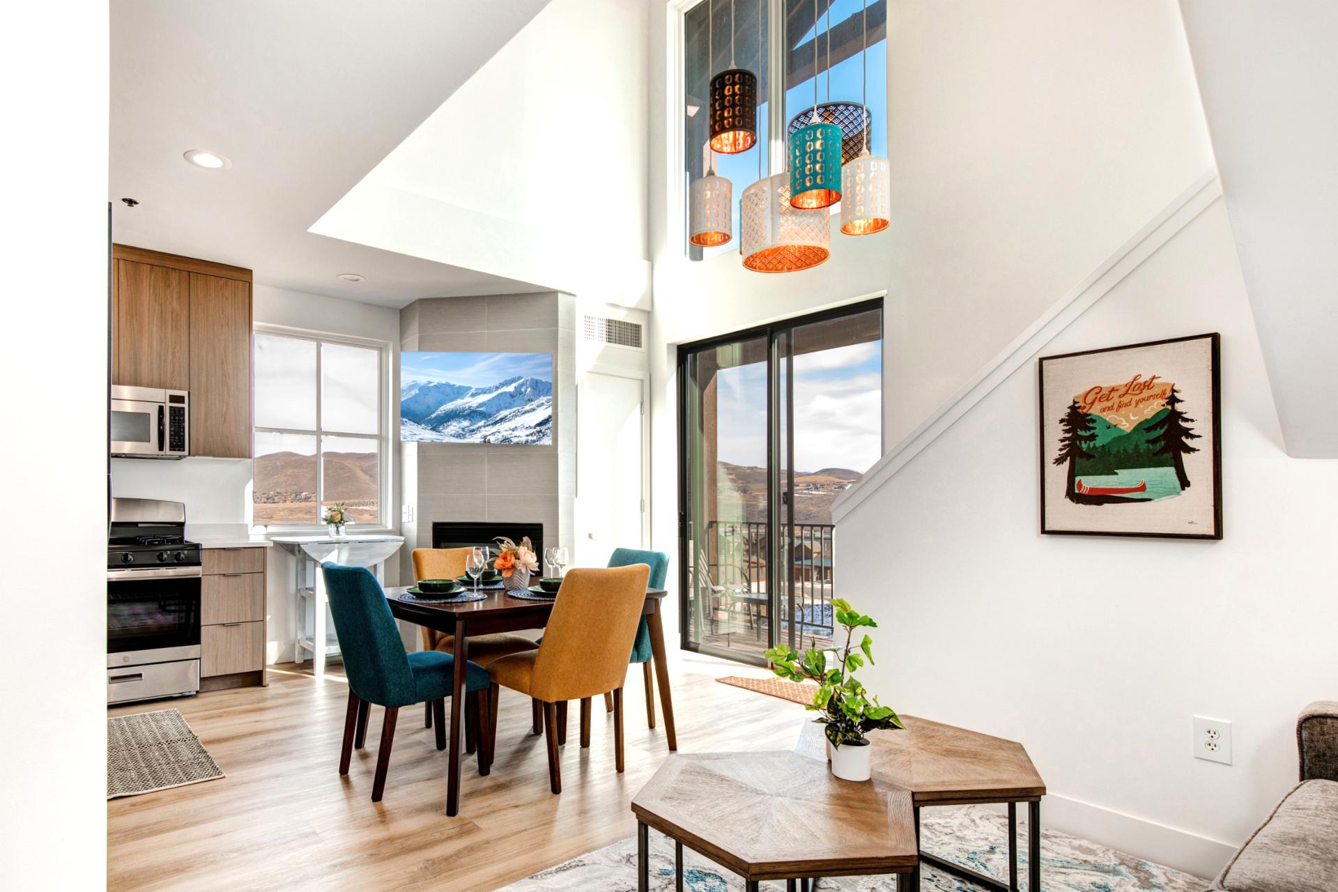 Vaulted ceilings and dramatic light fixtures elevate your dining experience in this airy, open space.