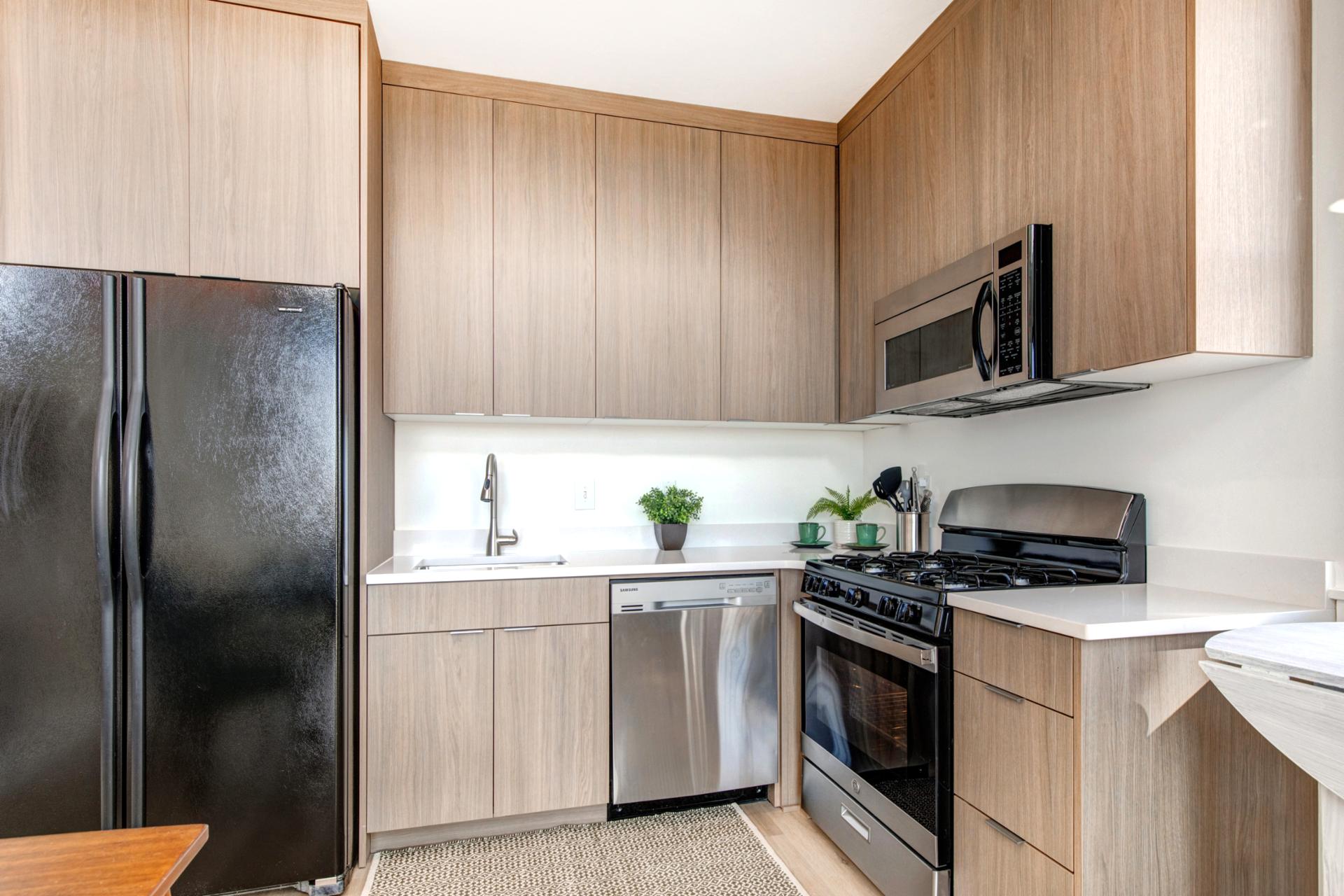 A full suite of appliances and sleek design make cooking at home both easy and enjoyable.