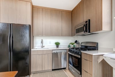 A full suite of appliances and sleek design make cooking at home both easy and enjoyable.