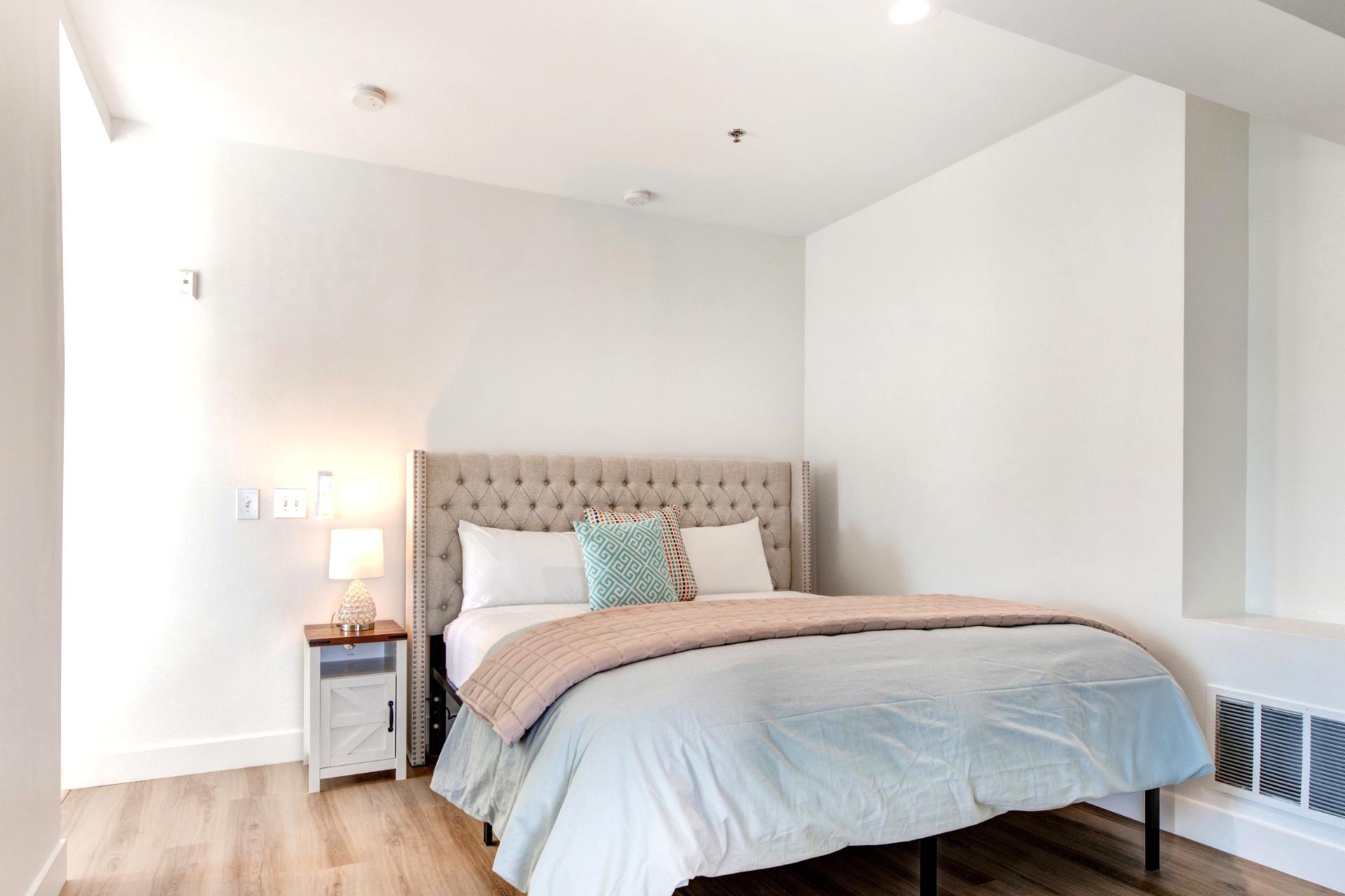 Retreat to your spacious upstairs primary suite with King bed, vaulted ceilings, and natural light.