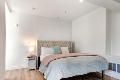 Retreat to your spacious upstairs primary suite with King bed, vaulted ceilings, and natural light.