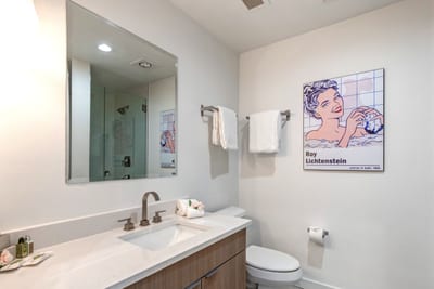 Each guest bath features updated counters, soft towels, and plenty of space to refresh.