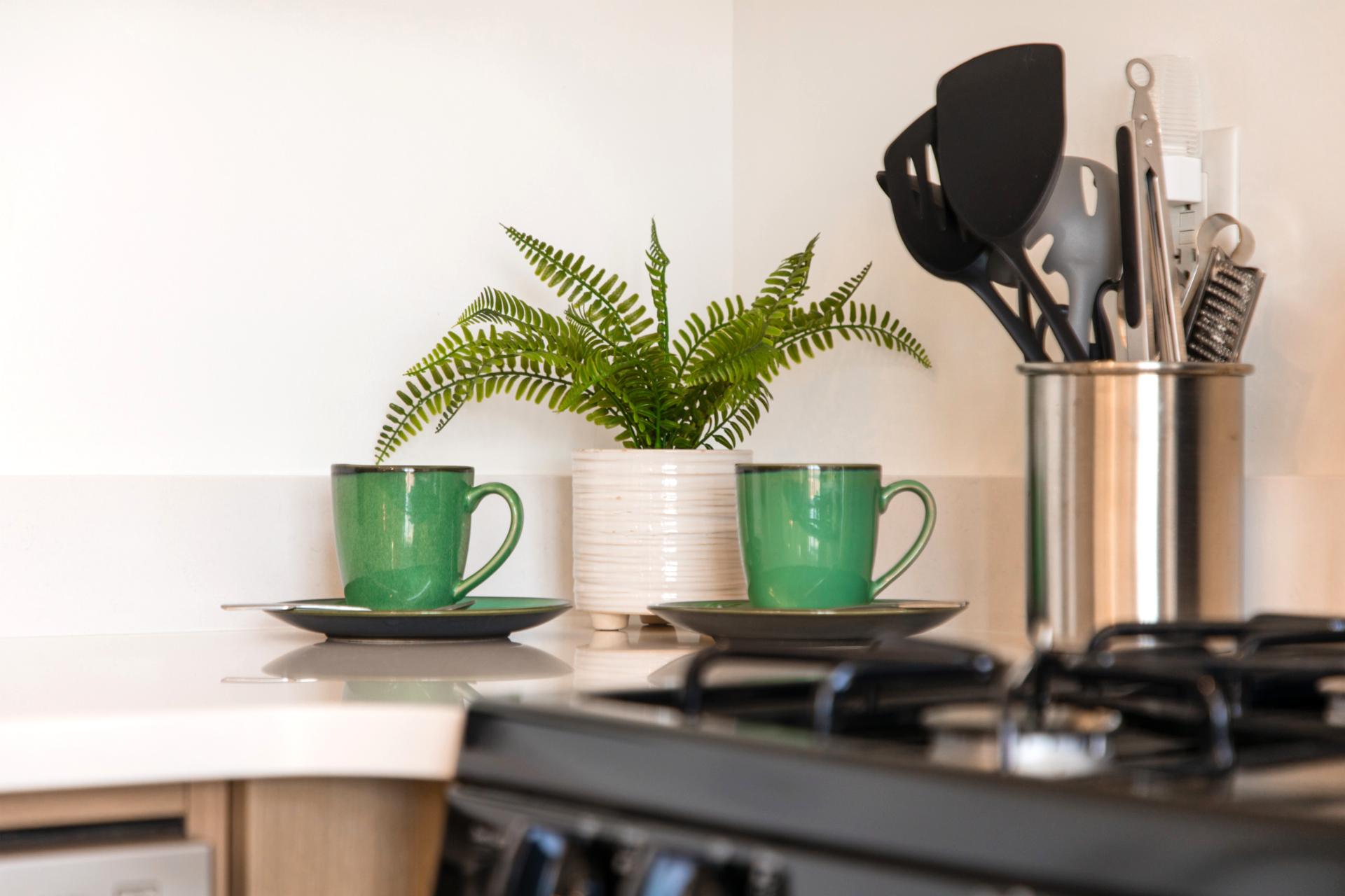 Whether you’re brewing coffee or prepping dinner, this kitchen is fully stocked and ready for use.