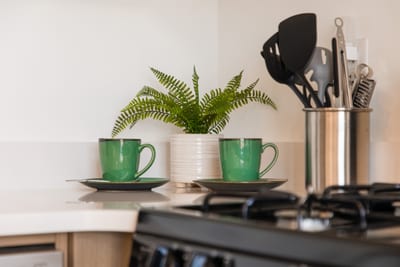 Whether you’re brewing coffee or prepping dinner, this kitchen is fully stocked and ready for use.