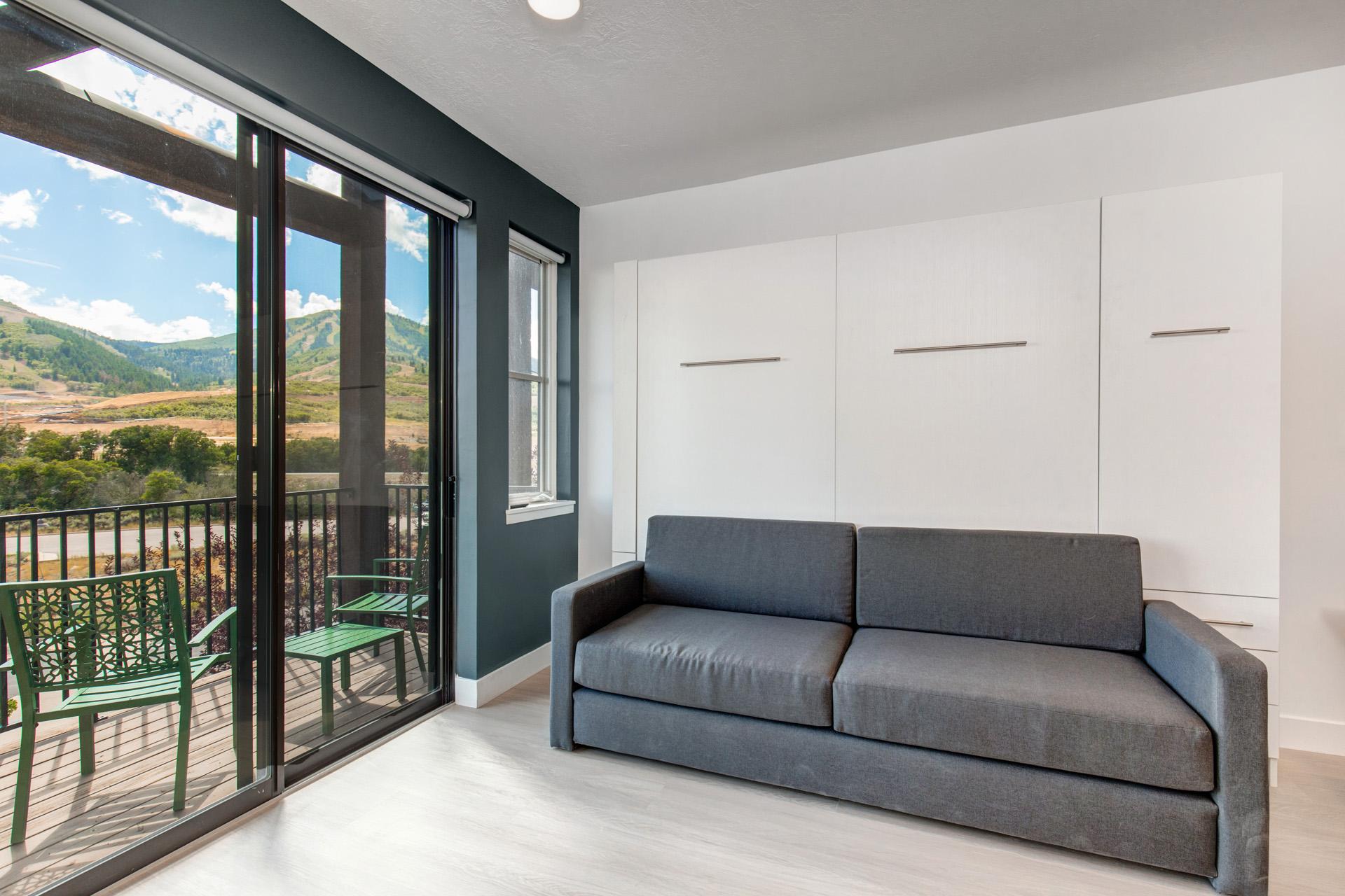 Pull open the doors to your private balcony and enjoy the mountain air from the comfort of your sofa.