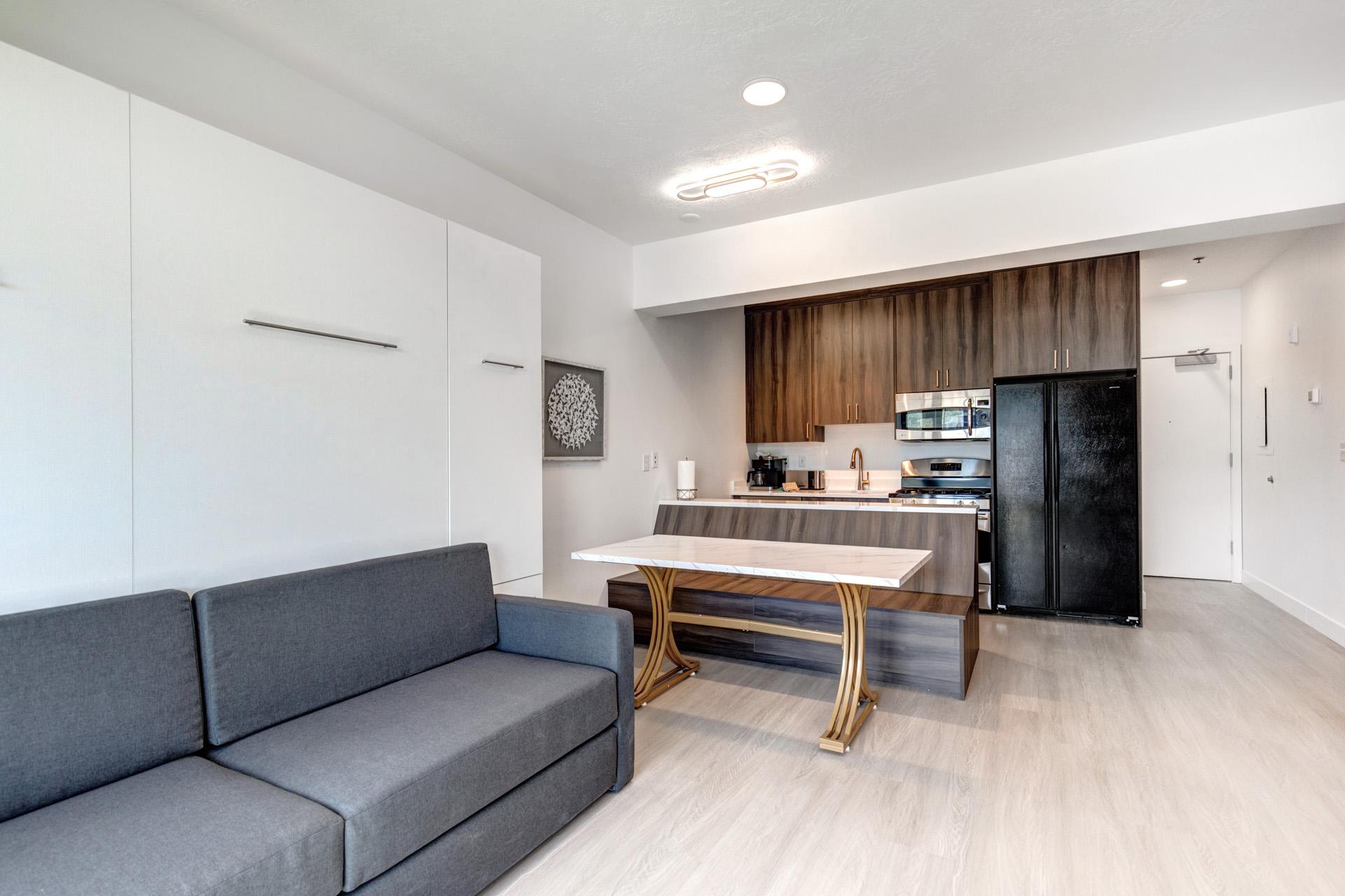 Sofa seating and a fireplace make this space perfect for evening relaxation or movie night.