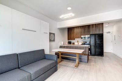 Sofa seating and a fireplace make this space perfect for evening relaxation or movie night.