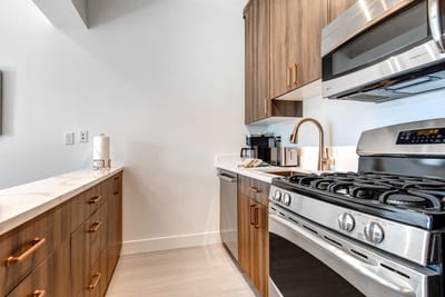 A gas range and full-size fridge give you all the tools for cooking your favorite vacation meals.