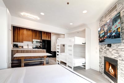 From board games to movies, this versatile space has room to unwind, dine, and sleep in comfort.