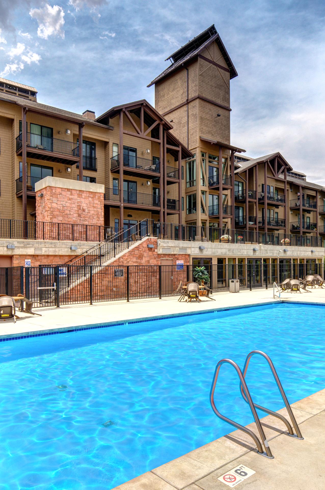 Cool off or unwind in the expansive pool area with plenty of space to lounge in the sun.