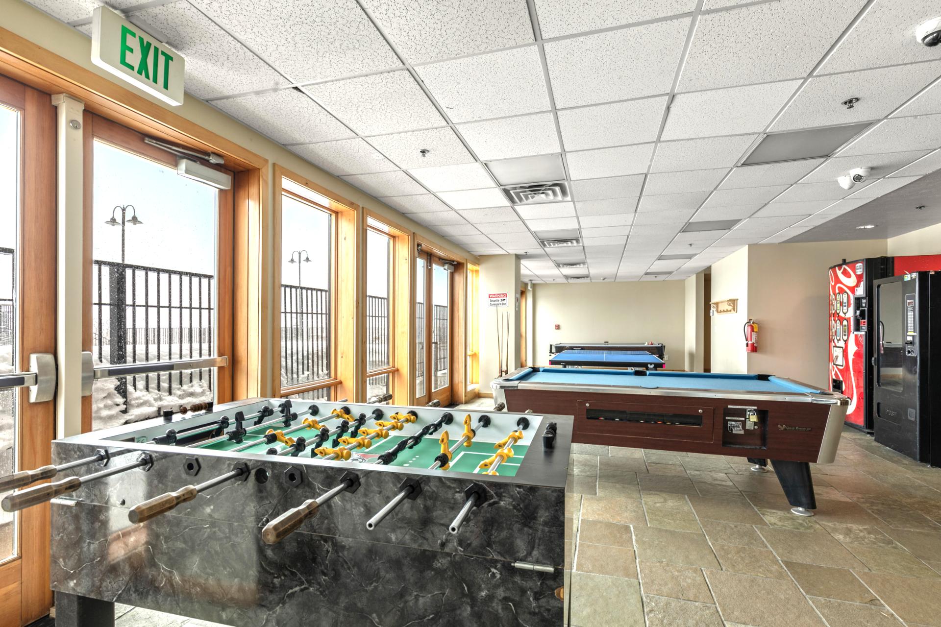 Challenge friends to a round of foosball or pool in the game lounge just downstairs.