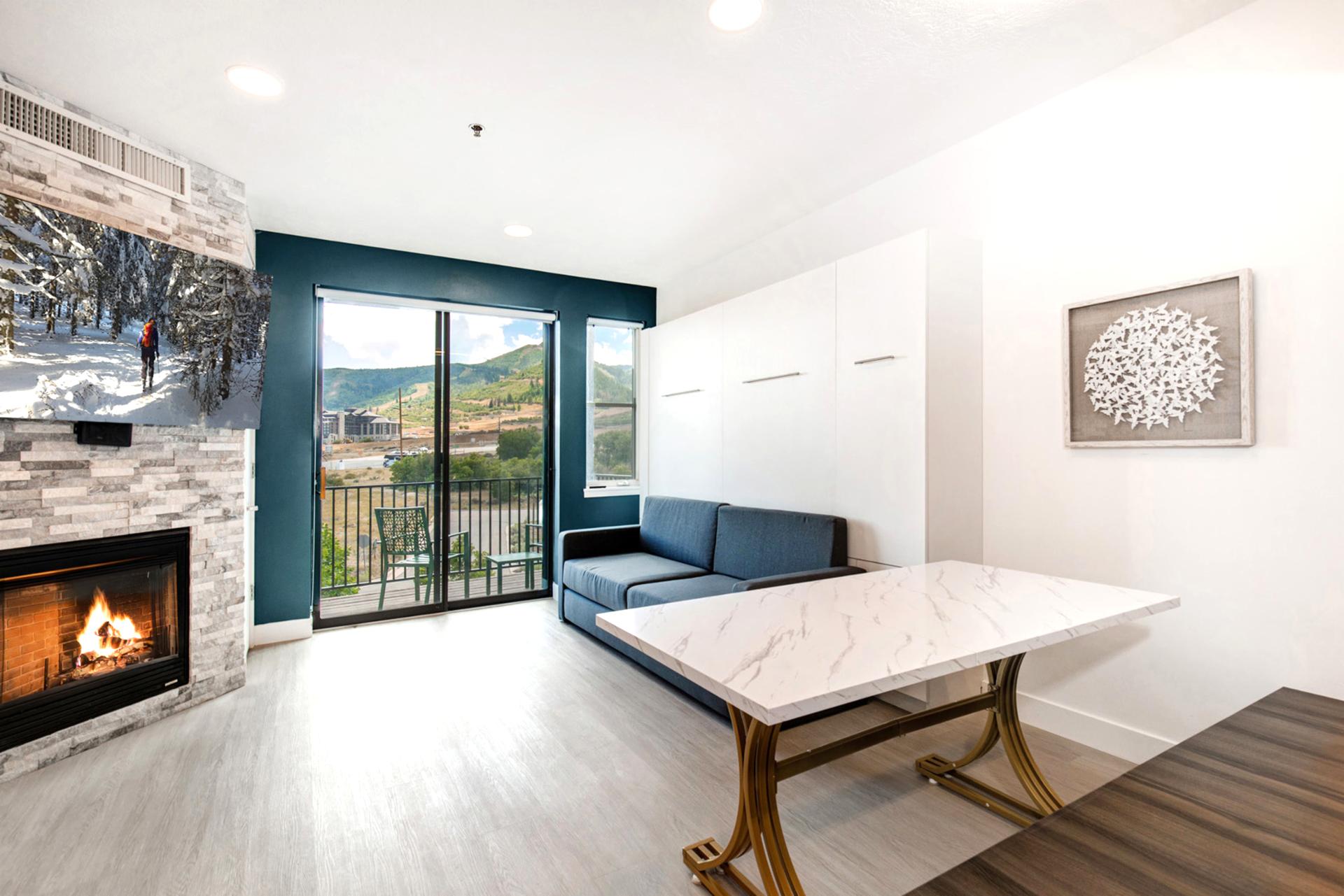 Let natural light pour into your living room by day, and curl up by the fireplace at night.