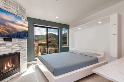Sleep soundly in the King-size Murphy bed with easy access to the fireplace and serene views just outside.