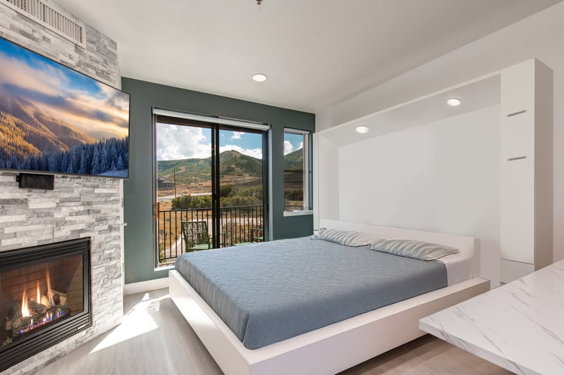 Sleep soundly in the King-size Murphy bed with easy access to the fireplace and serene views just outside.