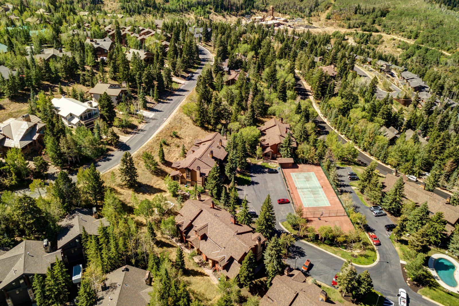 A closer aerial perspective reveals walking paths and community layout.