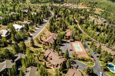 A closer aerial perspective reveals walking paths and community layout.
