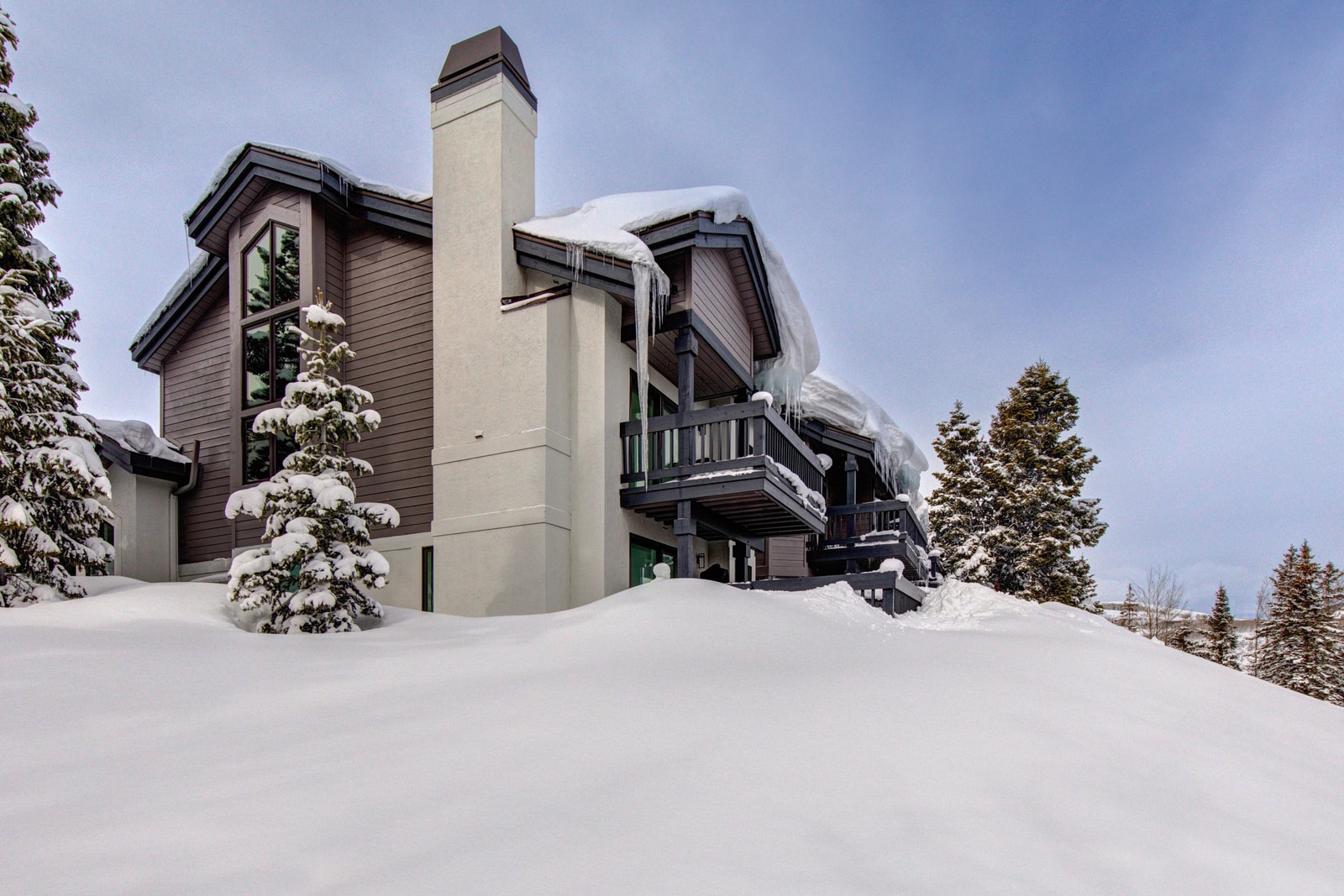 The building's alpine exterior offers a classic lodge feel with direct mountain access.