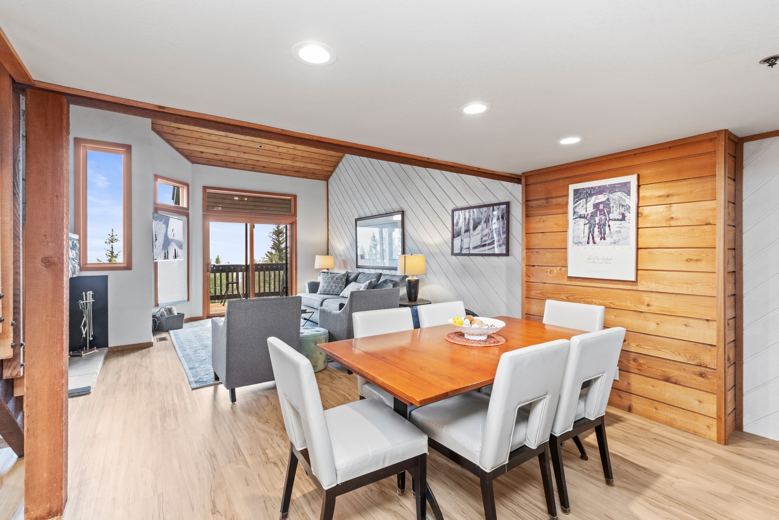 Share meals at the dining table for six with natural wood finishes and stylish mountain design.