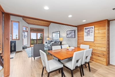Share meals at the dining table for six with natural wood finishes and stylish mountain design.