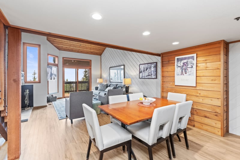 Share meals at the dining table for six with natural wood finishes and stylish mountain design.