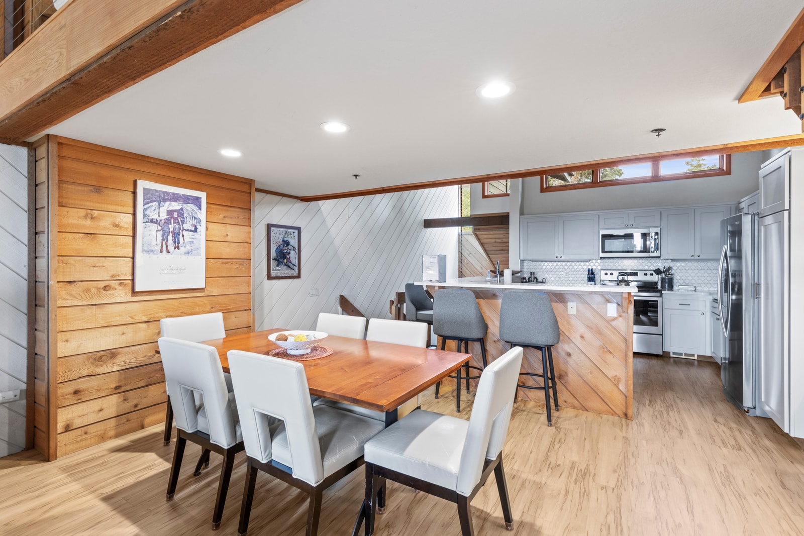 Open dining area with a clean layout connects directly to kitchen and living.