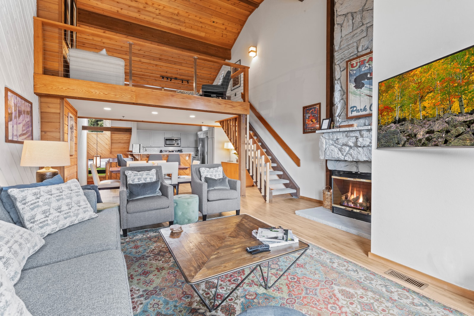 Second view of the living room with lofted ceilings and rustic beams, Ideal for après-ski lounging.