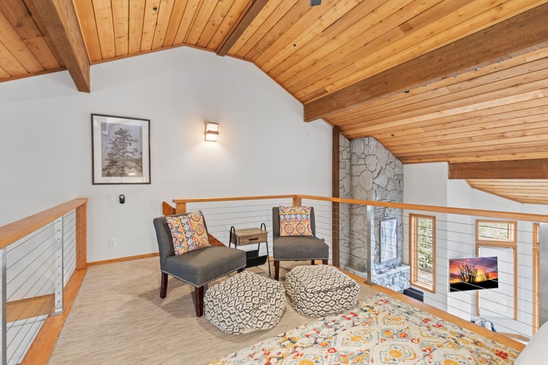 This cozy den nook is great for reading, board games, or a quiet afternoon nap.