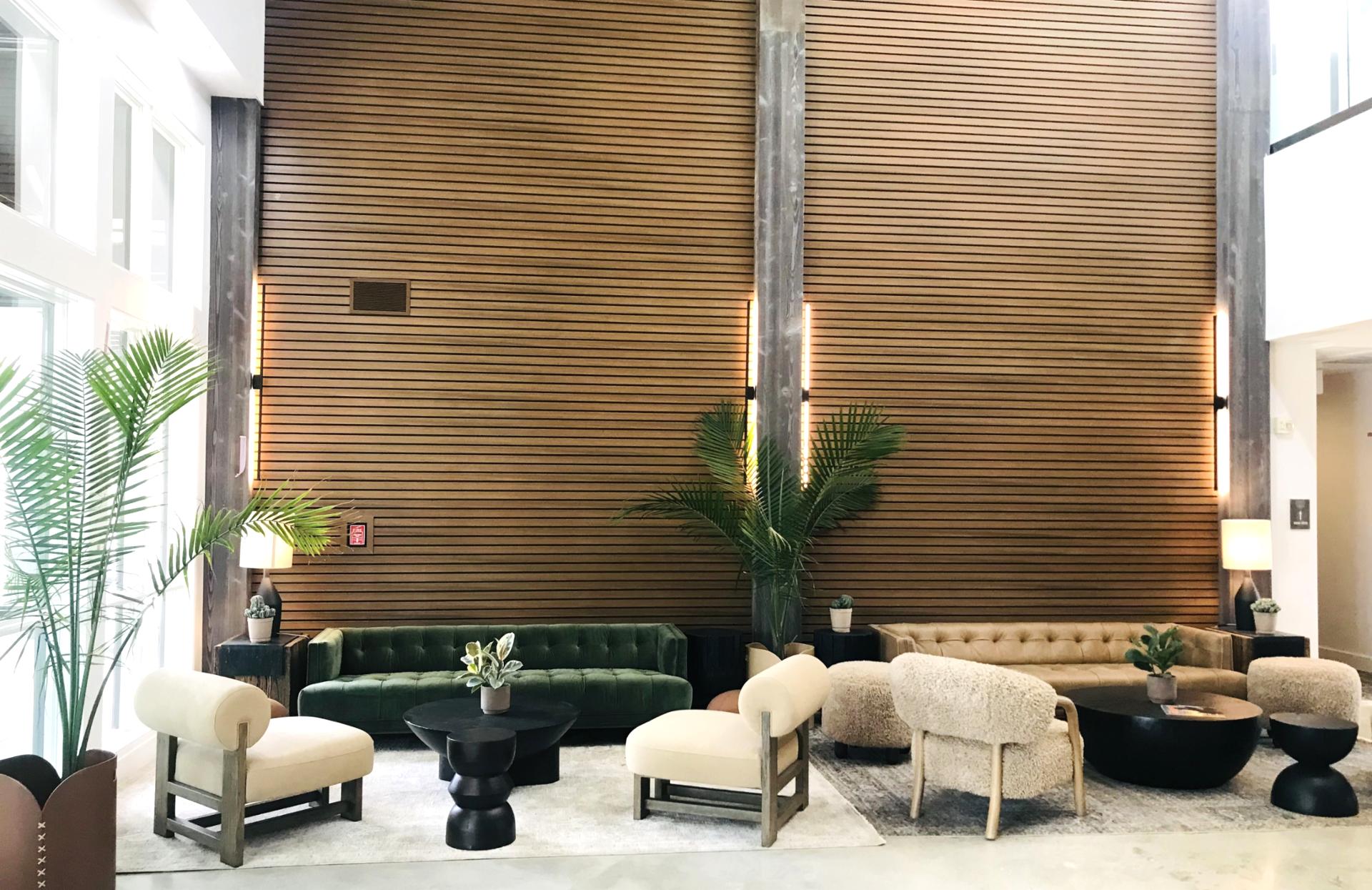 Relax in the elegant lobby at The Mason with soaring ceilings and sophisticated shared spaces.