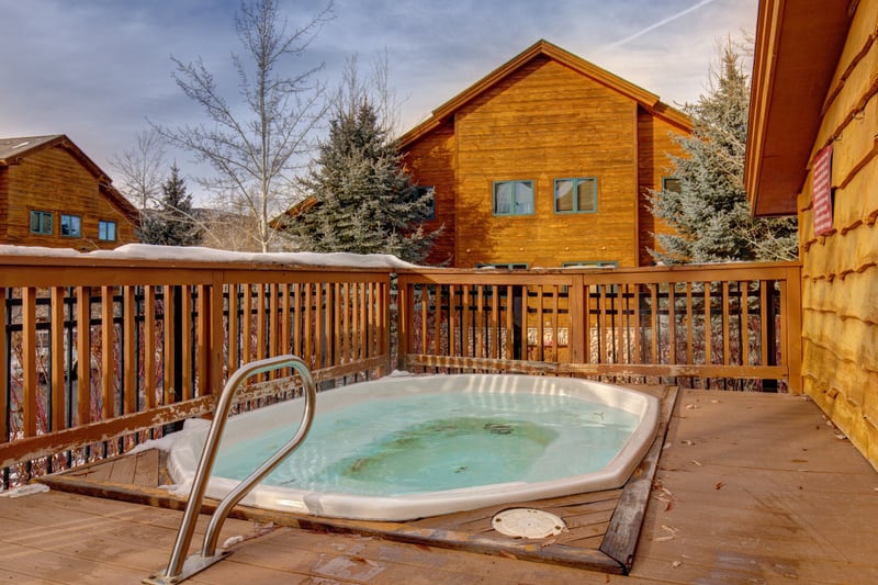 Relax in the common area hot tub just steps from your door, perfect for after-ski or starry evenings.