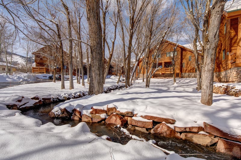 Snowy trees and a mountain setting create a peaceful winter backdrop just steps from your front door. TWL-5B