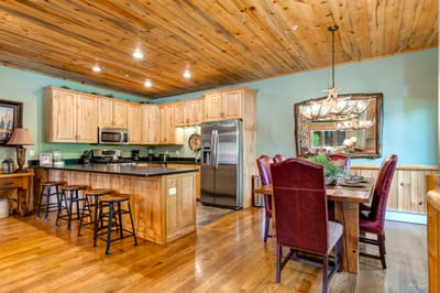 Dining area opens to the kitchen, ideal for casual breakfasts or shared dinners with family.