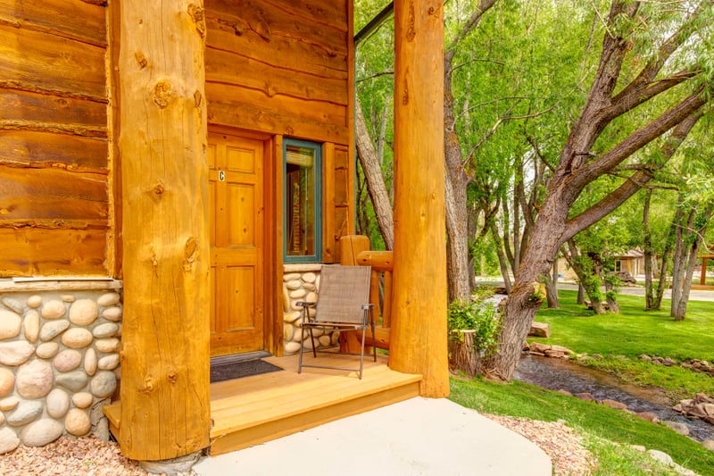 A welcoming entry path framed by trees leads to your two-story Park City condo.