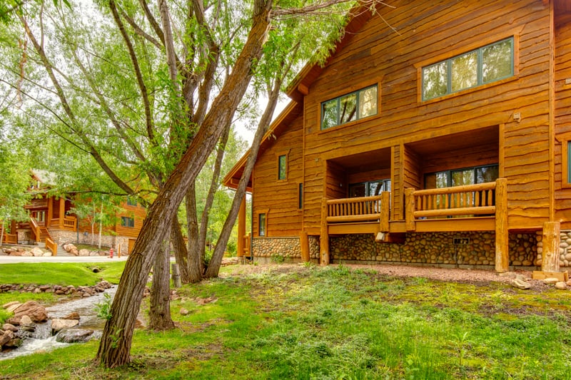 Rustic lodge exterior and natural surroundings offer classic Park City character and charm.
