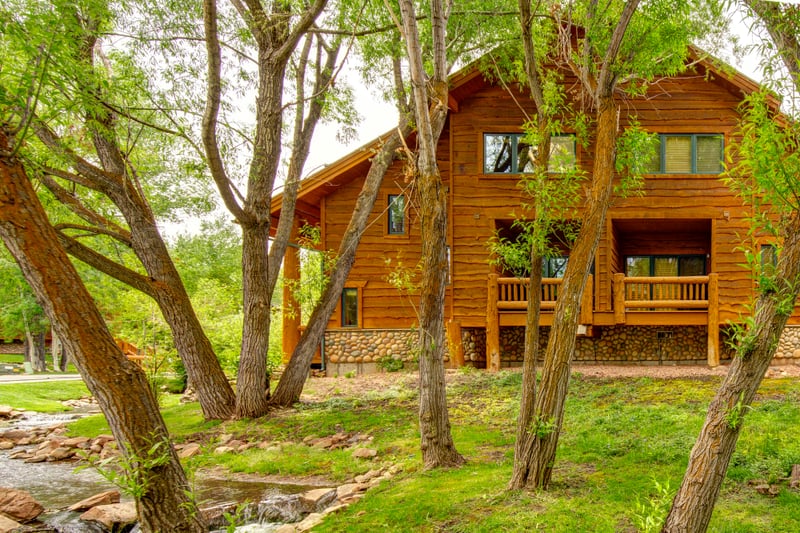 Peek through the trees to a peaceful neighborhood view from your private balcony.