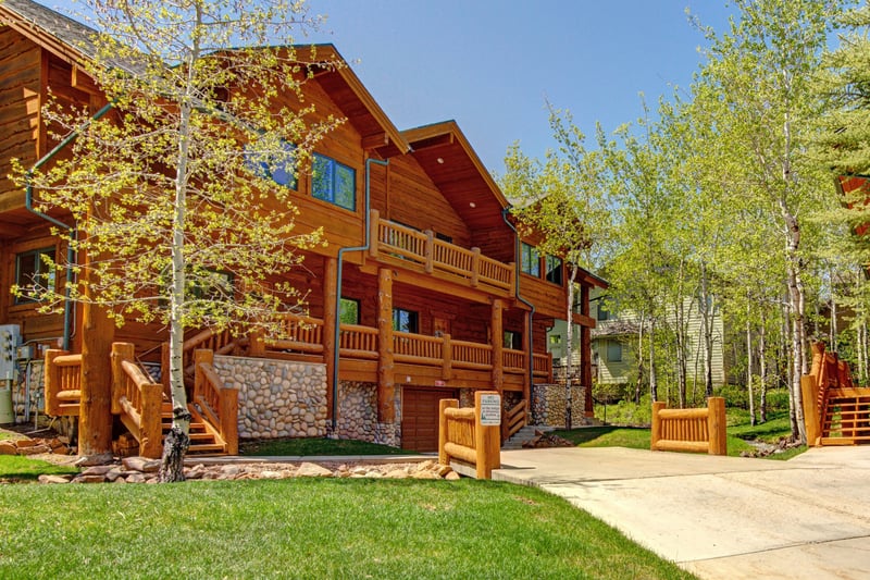 Timber lodge exteriors and surrounding trees make this condo feel like a true retreat. TWL-5B