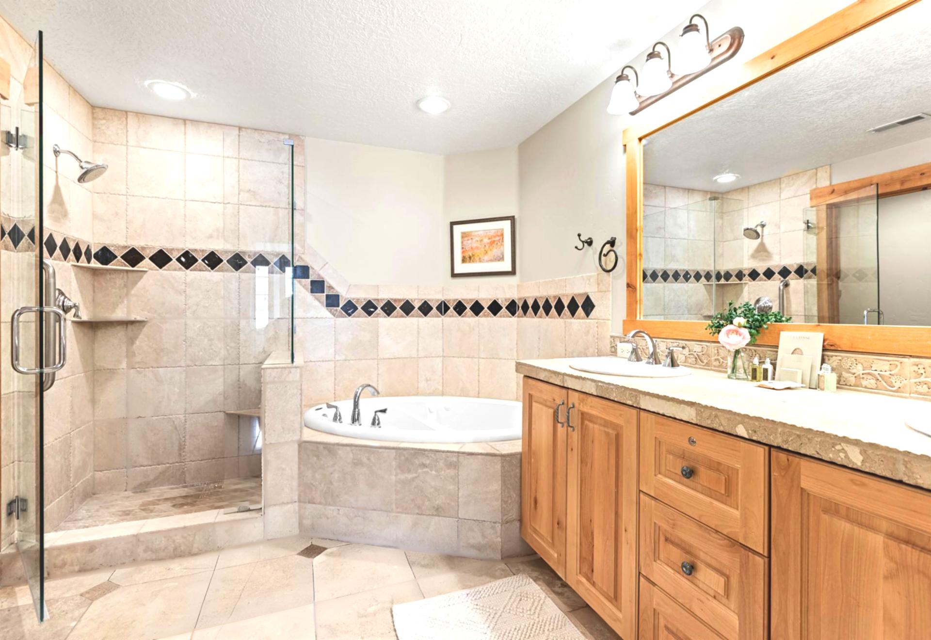Unwind in your ensuite with walk-in shower, soaking tub, dual vanity, and L’Occitane amenities.