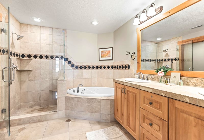 Unwind in your ensuite with walk-in shower, soaking tub, dual vanity
