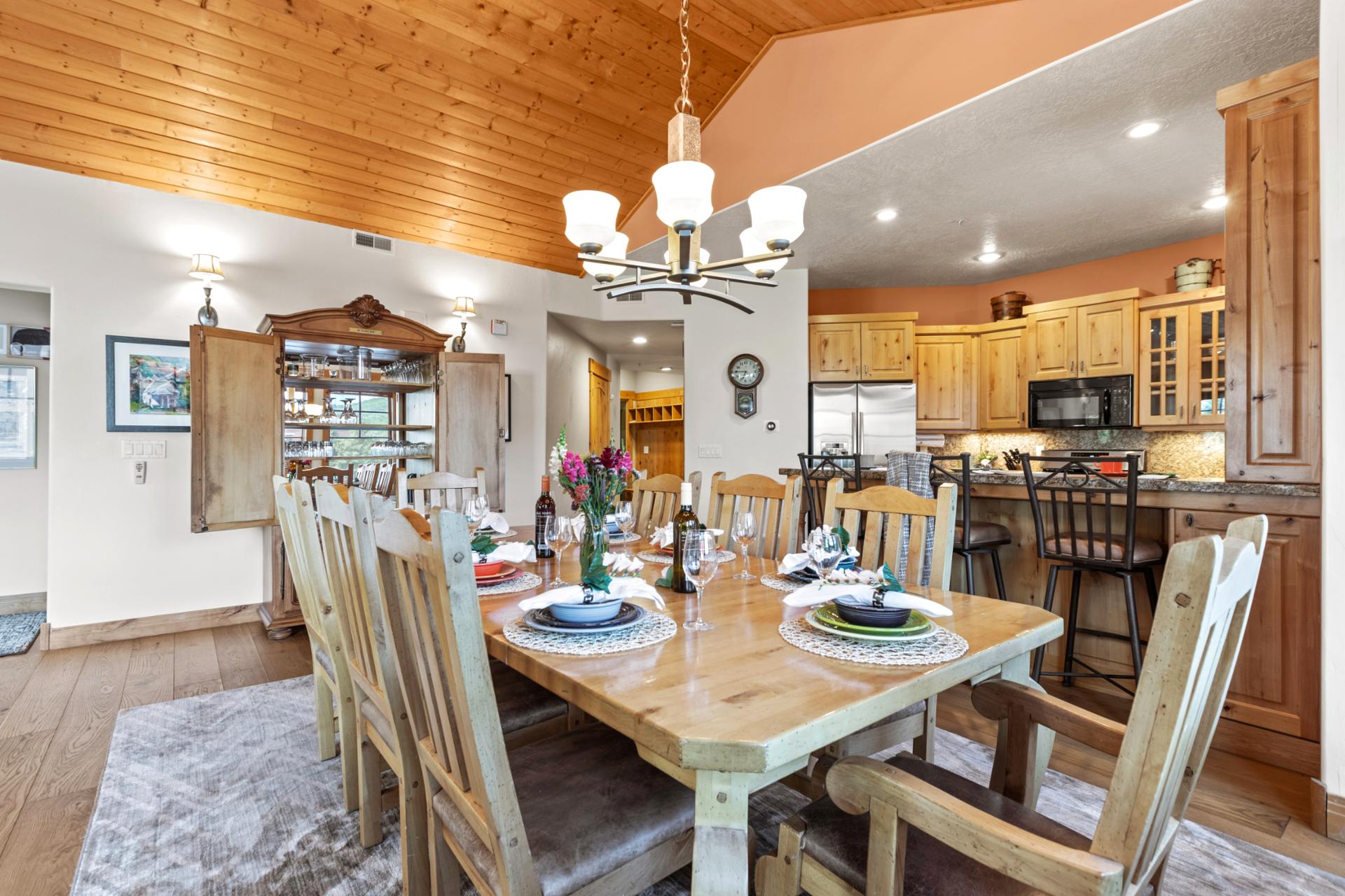 Share meals at the dining table for eight with natural wood finishes and mountain charm.
