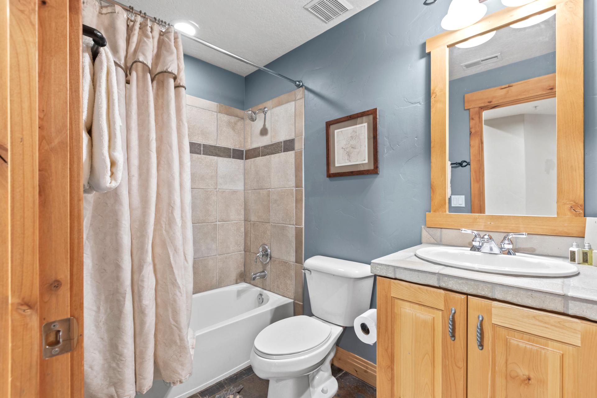 Bathroom 3 serves Bedroom 3 and includes full tub/shower combo with granite vanity.