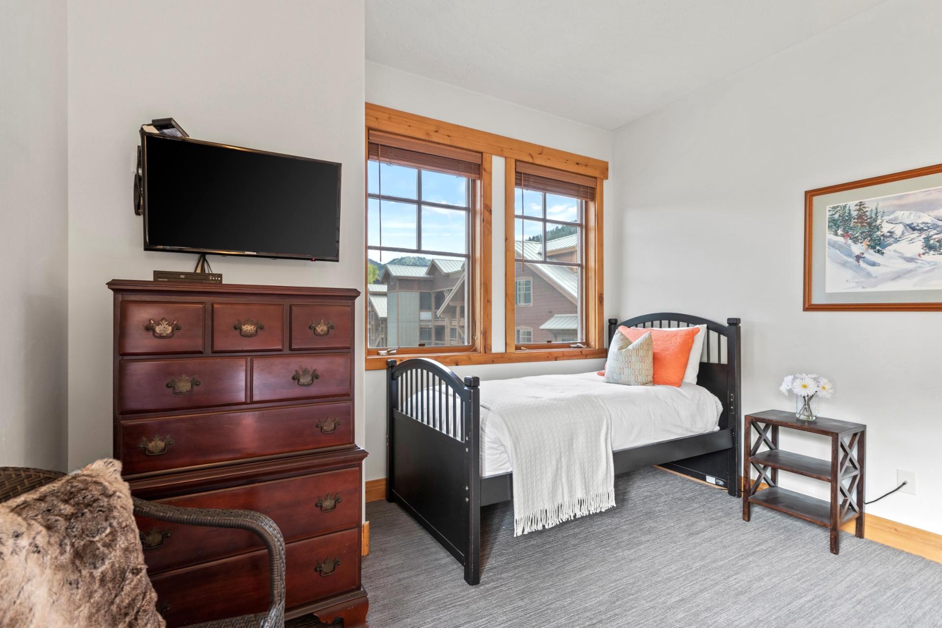 This third angle shows closet space and dresser for extended stays.